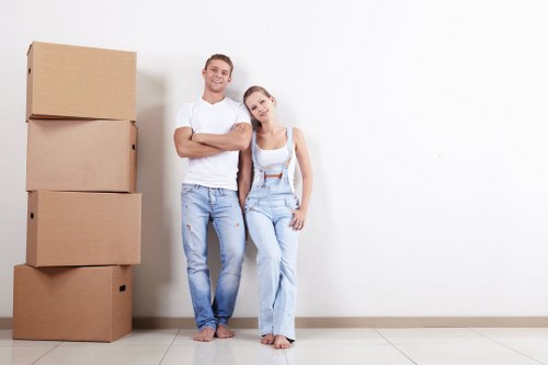 Removal team planning a flat move in Rotherhithe near riverside apartments