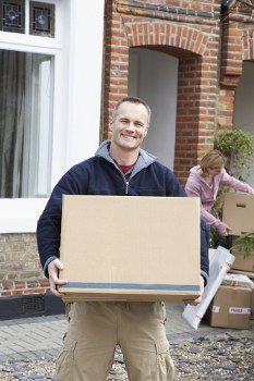House removal team planning a move in Rotherhithe near local flats and residential streets
