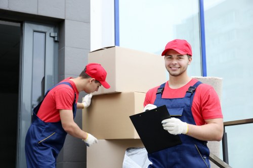 Local removals team planning a move in Rotherhithe near riverside apartments