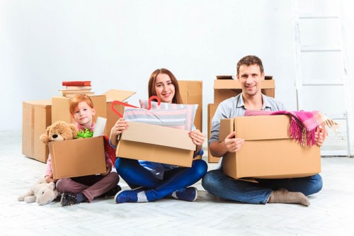 Packed boxes and furniture ready for local removal services