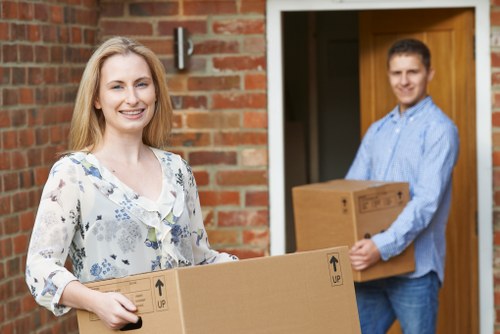 Careful wrapping of fragile household items during a local move