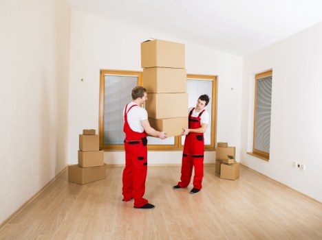 Dismantled furniture and labelled boxes prepared for a home move in Rotherhithe